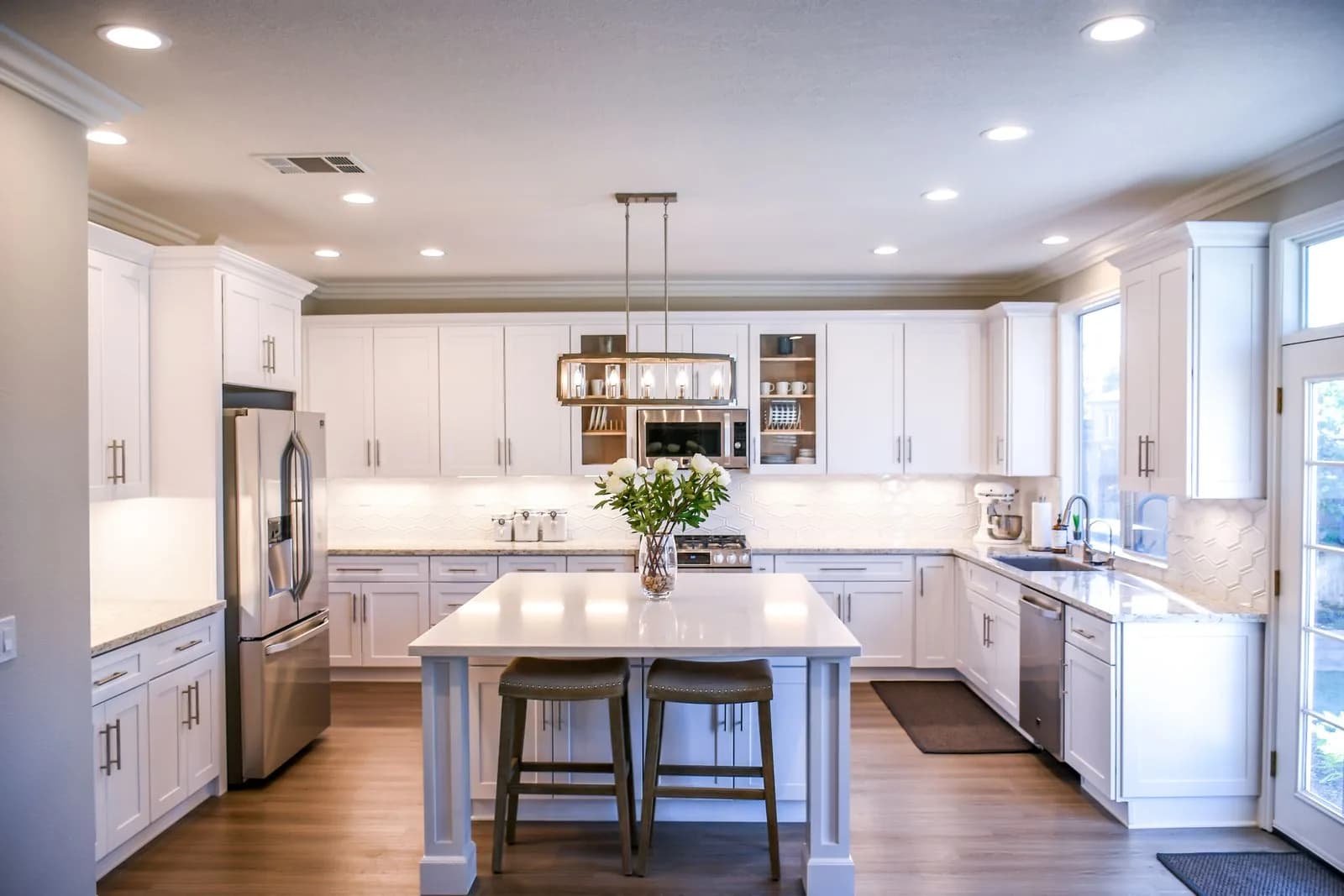 Bright modern kitchen with an island and pendant lights